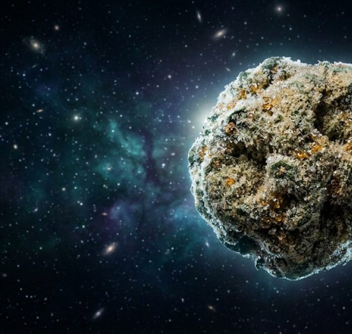 Moon Rock CBD ricoperto di kief cristallino raffigurato come una luna nello spazio con nebulosa e stelle — le "rocce lunari" in versione cannabis light